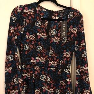Timing long sleeve floral Bell romper size small